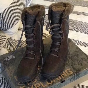 Never worn North Face Nuptse Purna boots